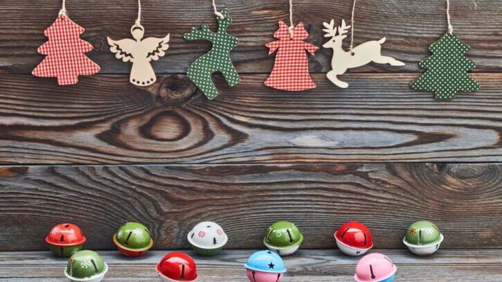 christmas-decoration-hanging-on-wooden-background